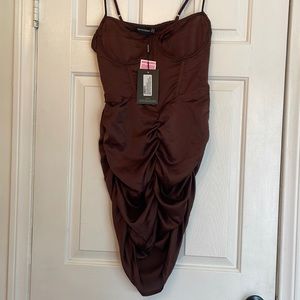 Pretty little things strapped dress w/ corset detail & ruched skirt.